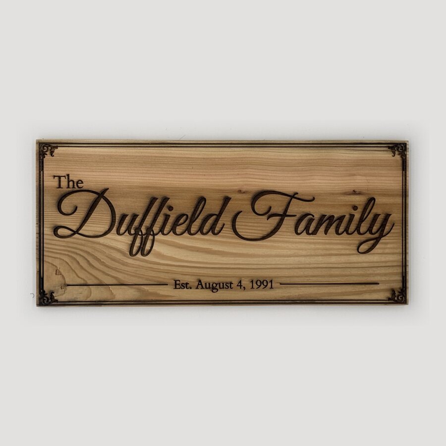 The Duffield Family cedar sign, established 1991